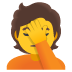 sich an den Kopf fassende Person