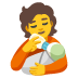 Person, die Baby die Flasche gibt
